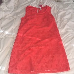 Patterned, salmon colored dress